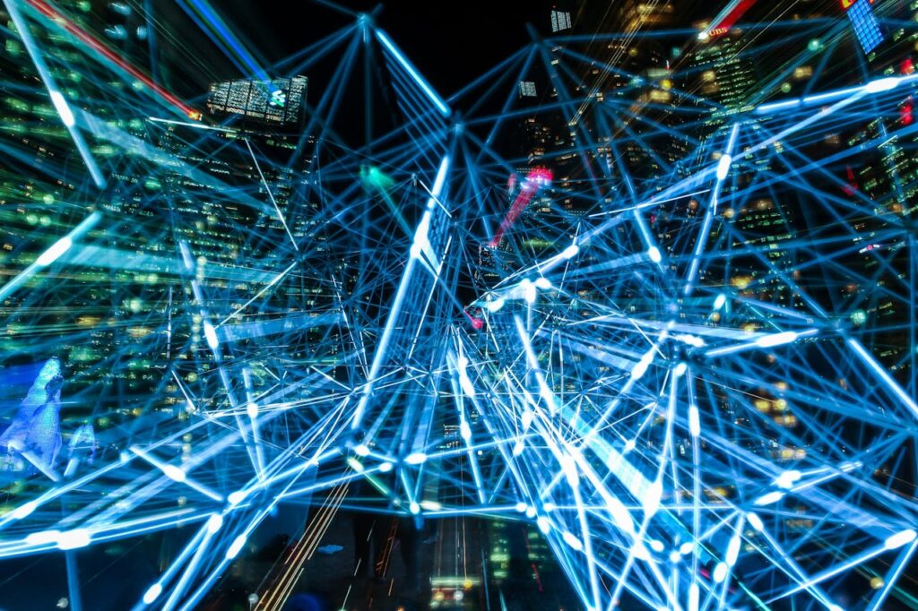 pexels-photo-373543 Dynamic urban scene showcasing interconnected light trails representing digital communication networks.